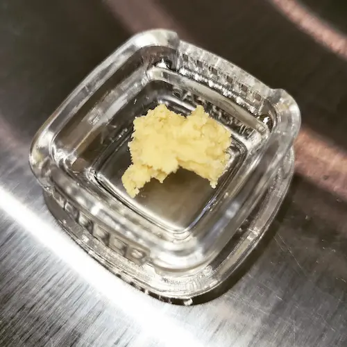 Montana Janes Hard Times Hash hash rosin in a glass container