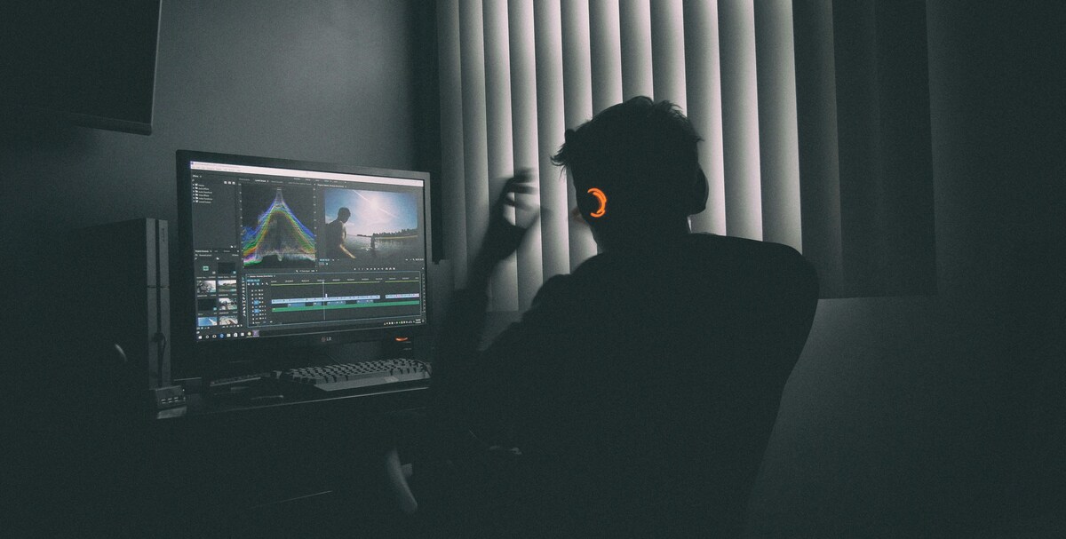 Video editor using B-roll footage to create a dynamic corporate video sequence