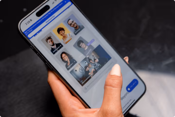 a person holding a cell phone with a facebook page on the screen