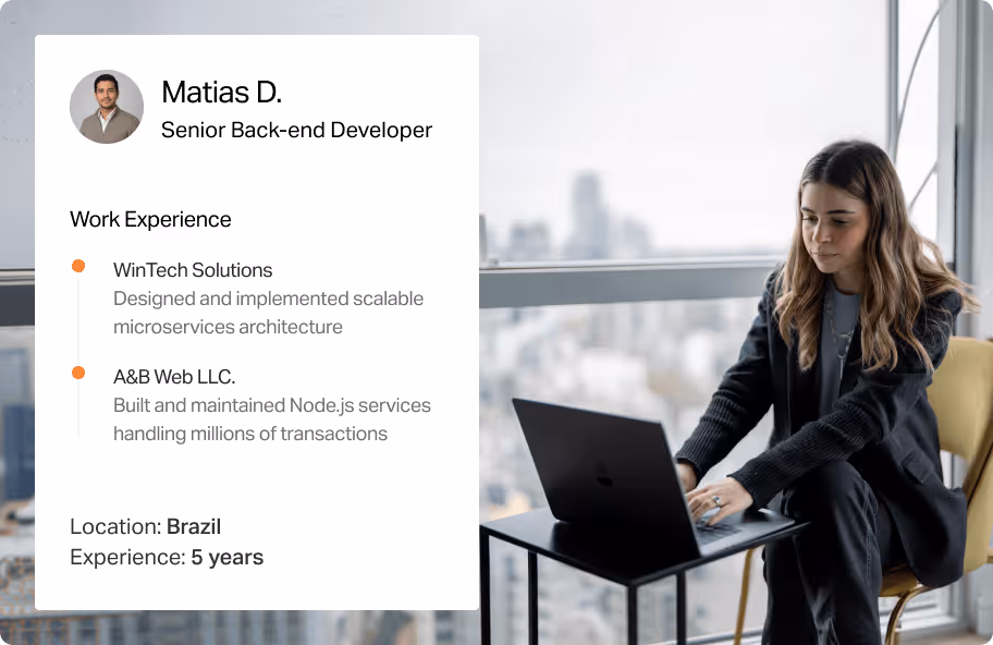 Woman with long hair working on a laptop near window, with a developer profile summary on the left.