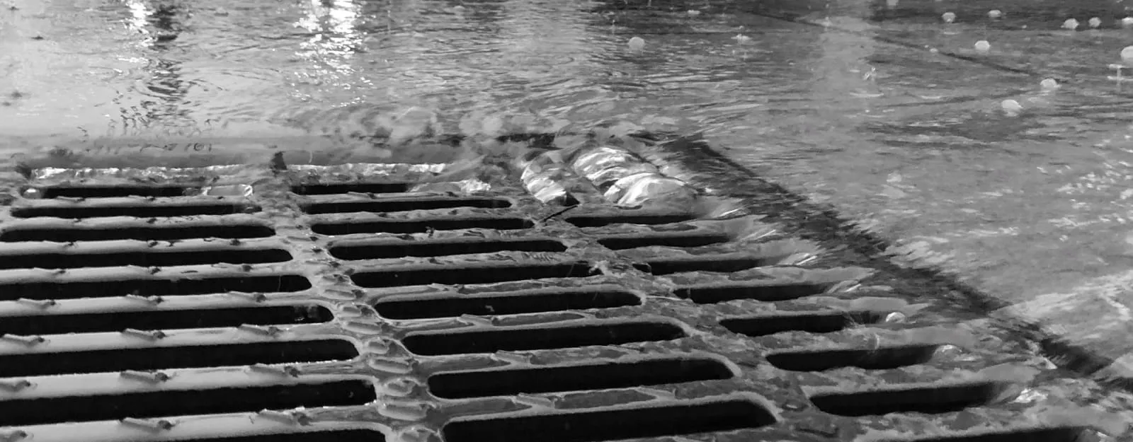 photo of catch basin draining water