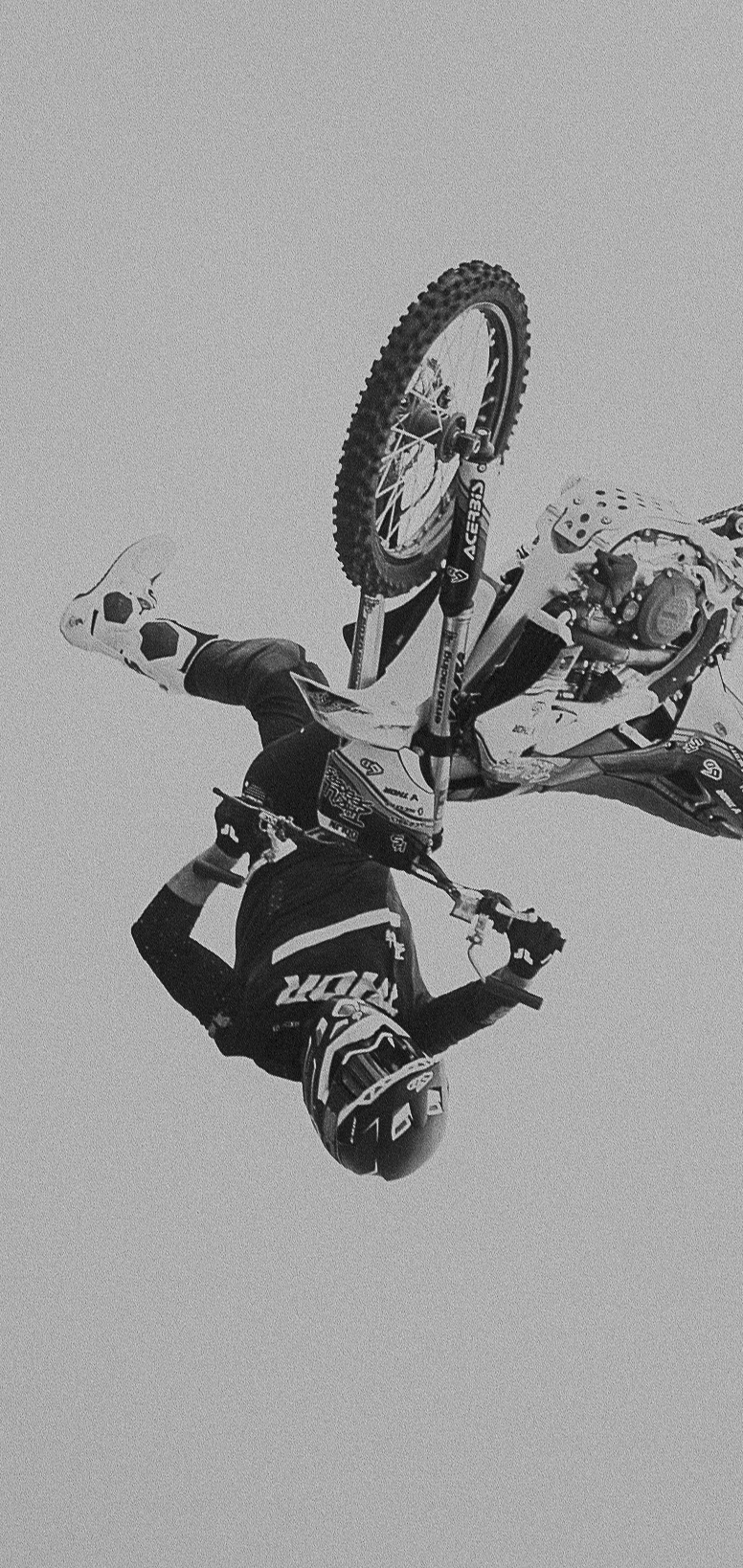 A sunset with fisherman in foreground