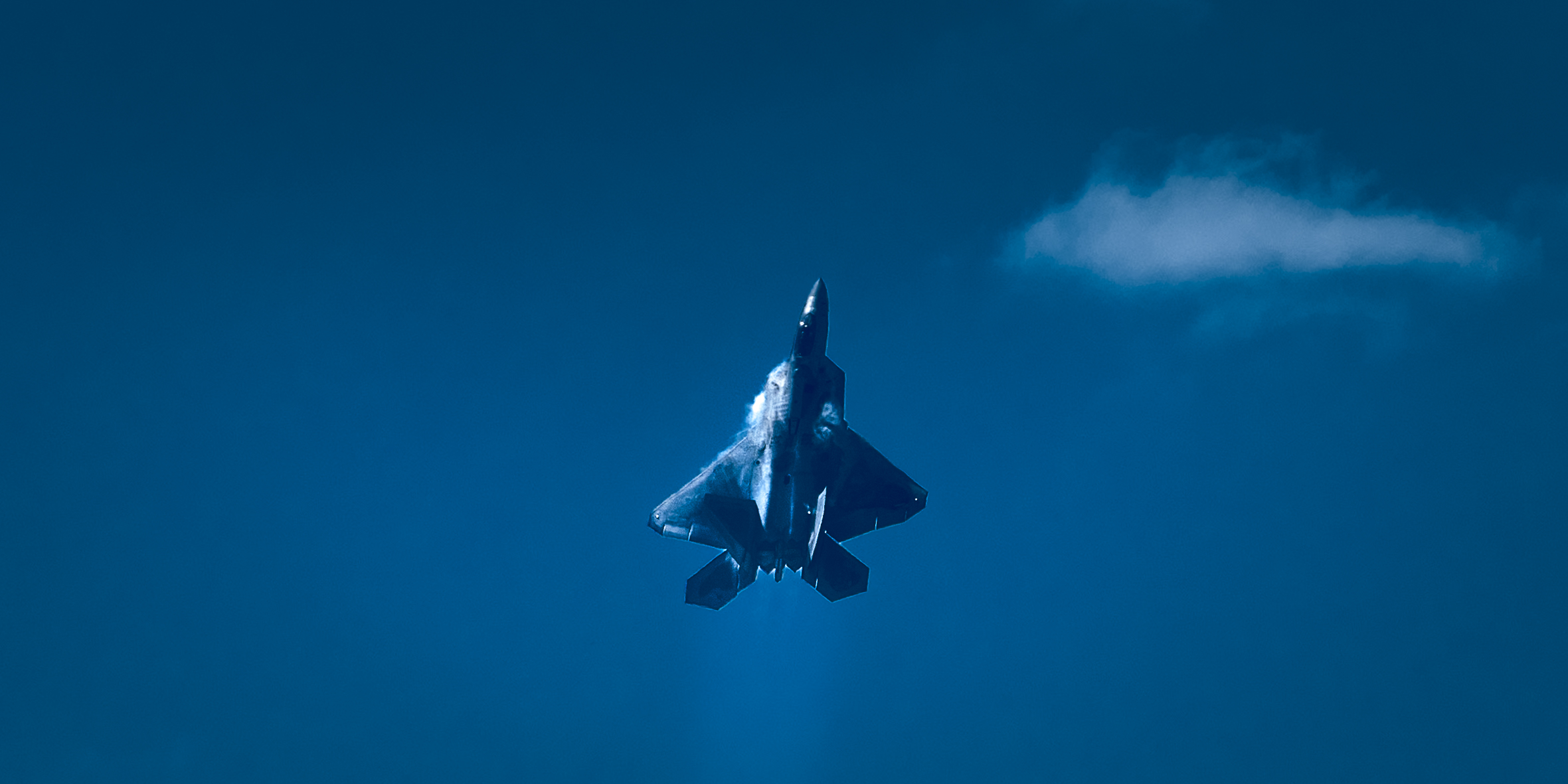 A sunset with fisherman in foreground
