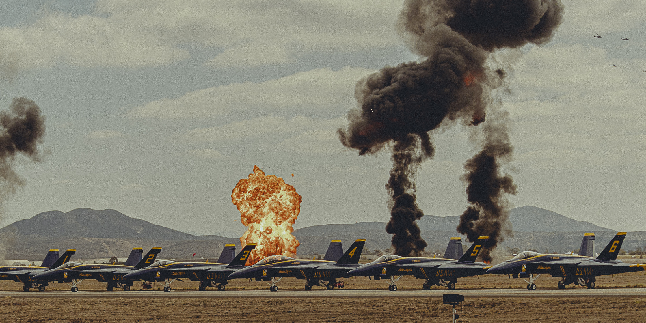 A sunset with fisherman in foreground