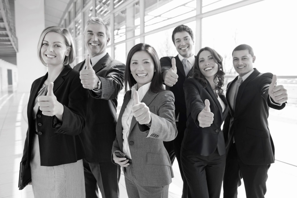 a team giving a thumbs up