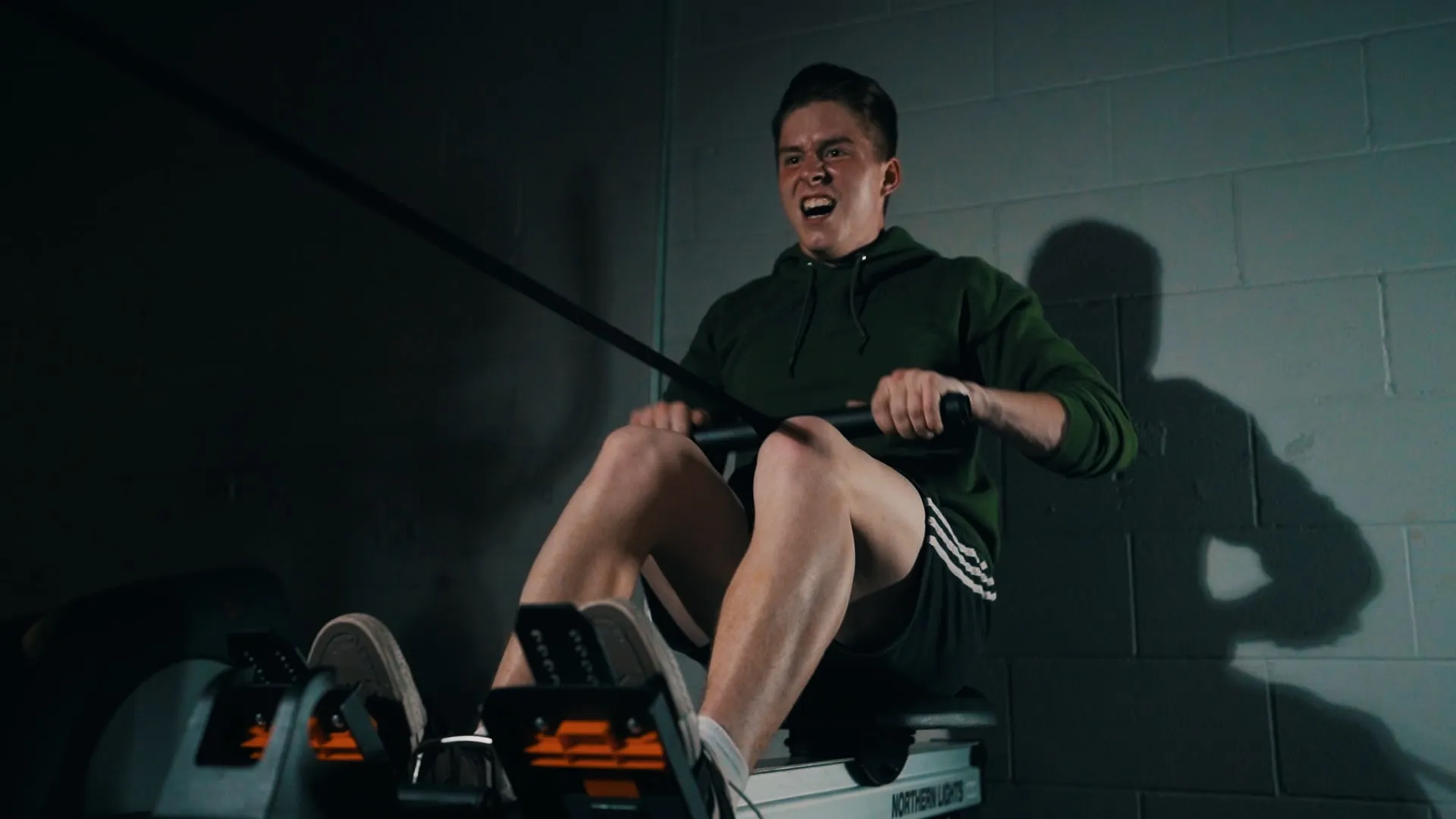 Man doing rows on a row machine