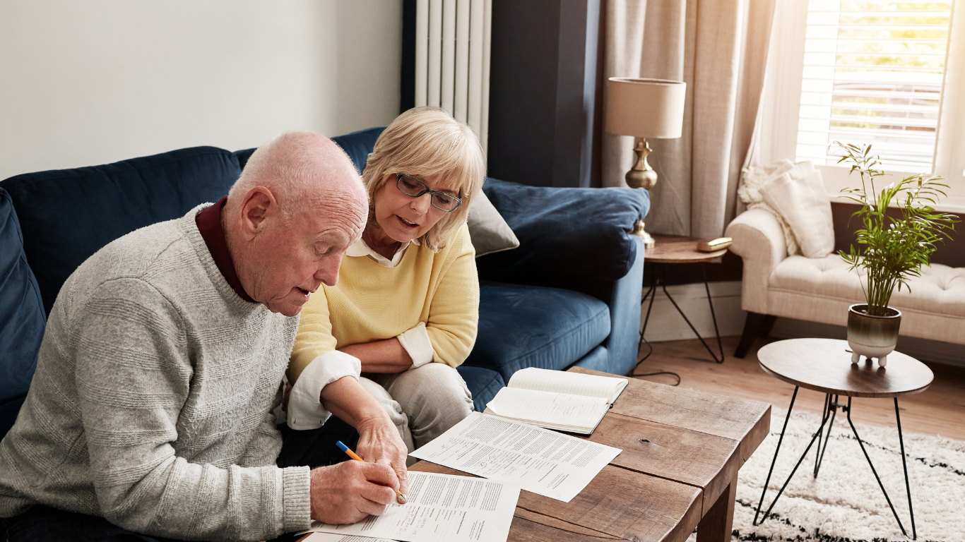 Residential care subsidy thresholds have increased - elderly couple completing an application