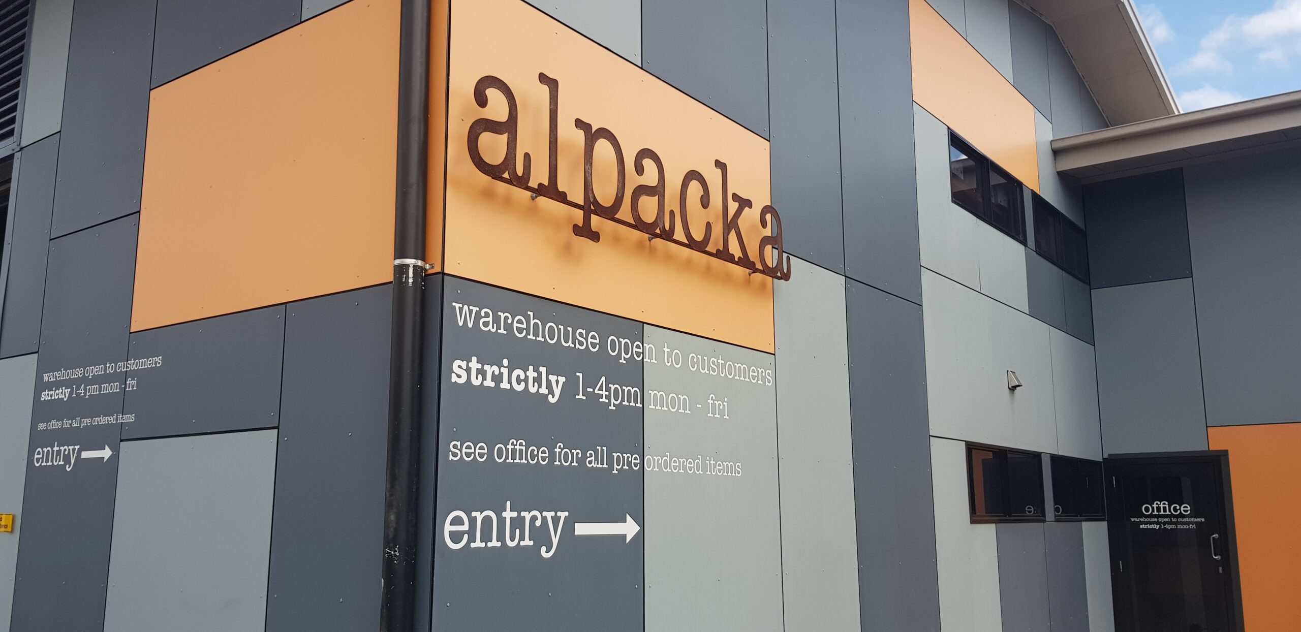 Banner image featuring Alpacka Fulfillment's logo with hands exchanging a packed box, highlighting their e-commerce fulfillment services and warehouse solutions.
