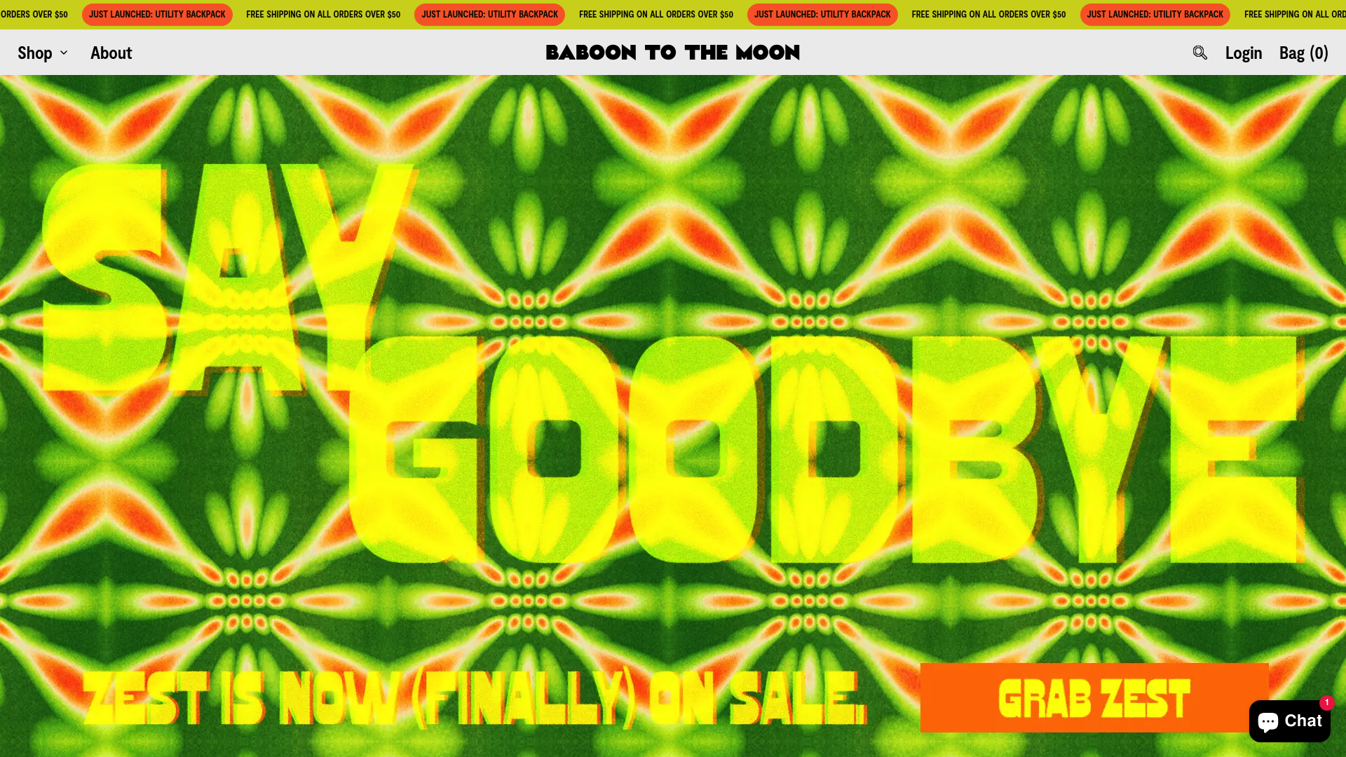 A screenshot of Baboon To The Moon's homepage showing a vibrant, adventurous aesthetic with a colorful, playful design. The logo features a bold, modern typeface embodying a sense of exploration and fun. The layout is clean with a large hero image showcasing vibrant bags designed for adventure. The site uses a bright color scheme, mainly featuring bold tones like neon and primary colors, reflecting the brand's energetic and youthful spirit. Prominent text includes taglines emphasizing the durability and lifetime warranty of their products. The homepage conveys a brand personality that is dynamic and inclusive, appealing to young, adventure-loving demographics with a taste for stylish yet practical gear. Product types include versatile technical bags with innovative features, displayed with lifestyle imagery that highlights their use in active, travel-friendly settings, emphasizing durability and versatility as key selling points.