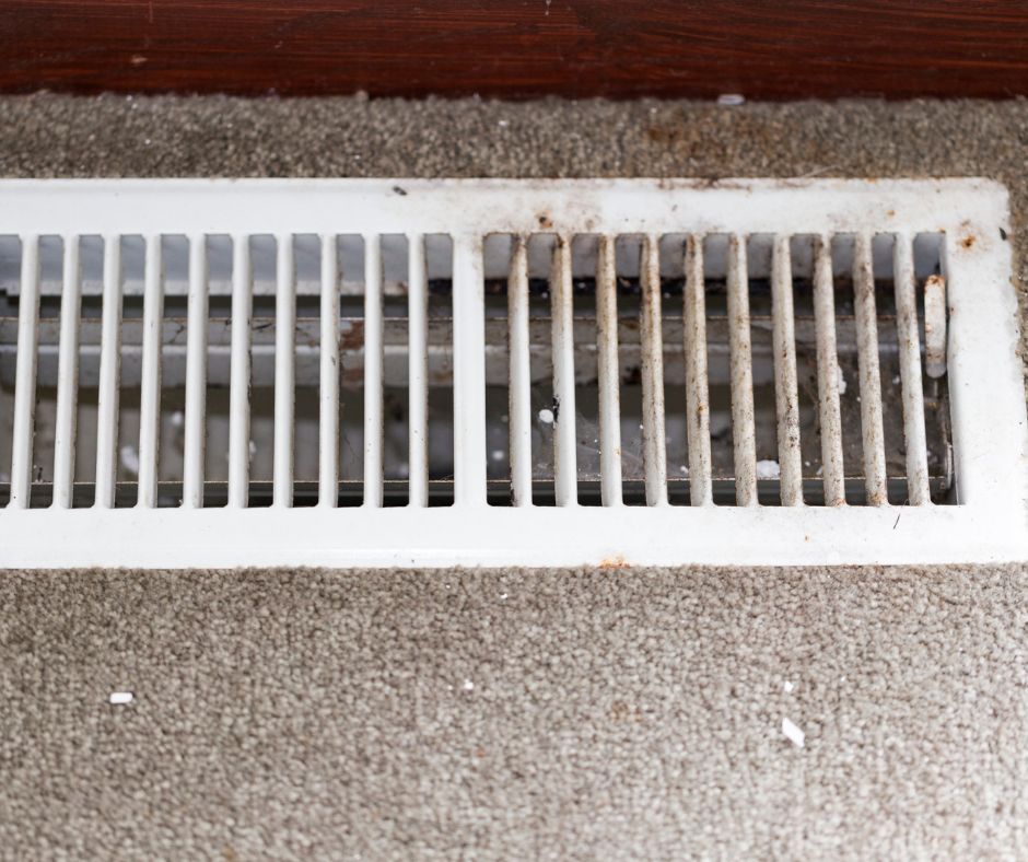 Visible dust buildup surrounding an air vent.