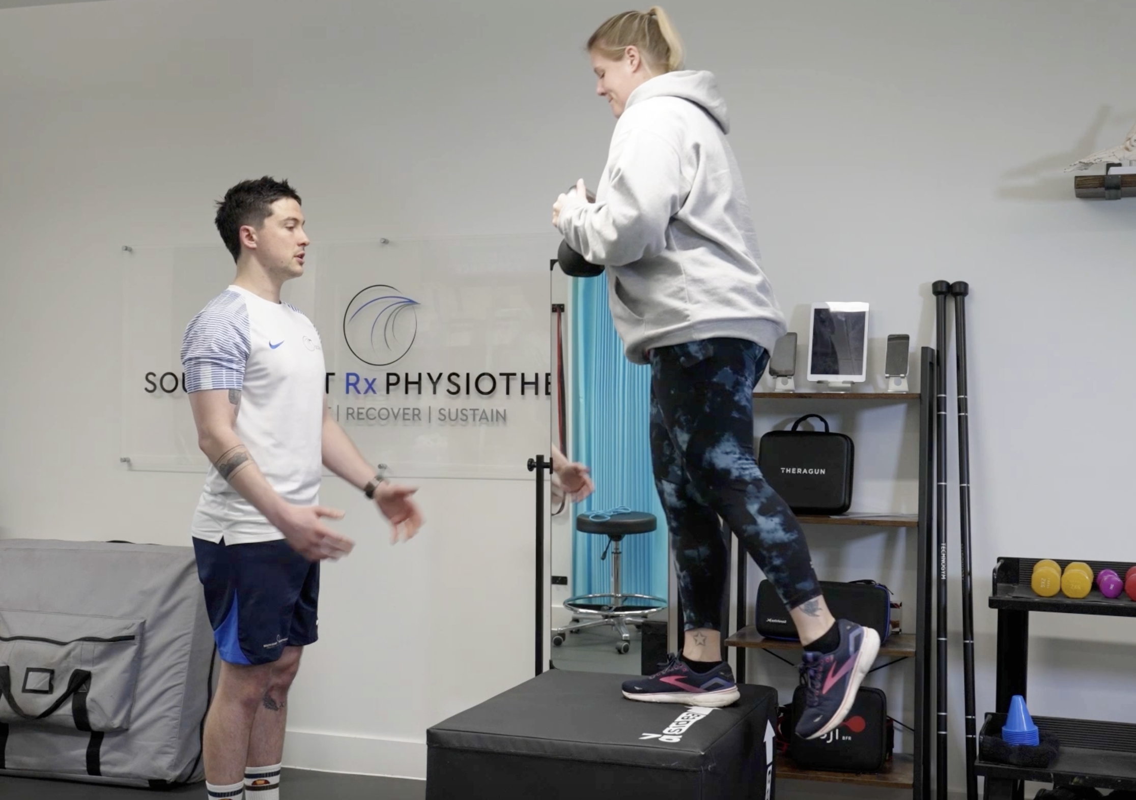 Patient stepping onto a plyo box during a session at South Coast Rx Physiotherapy clinic