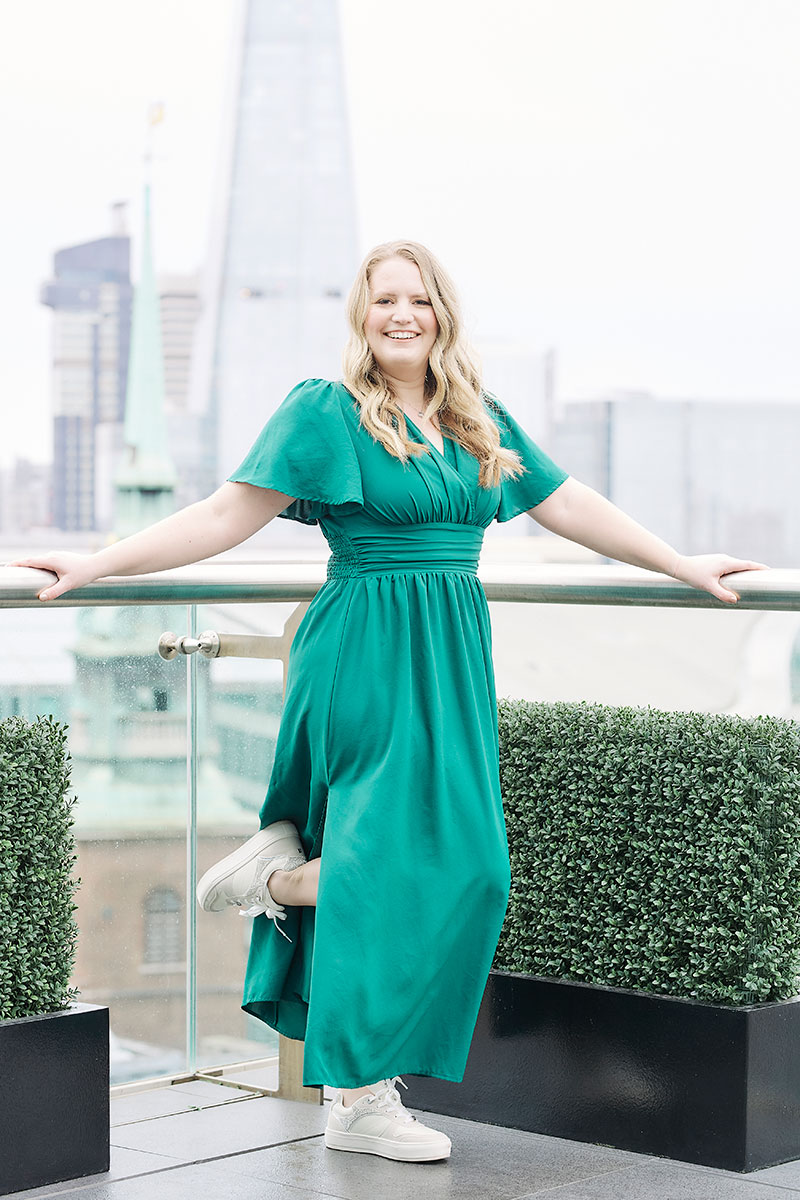A wedding planner working on her marketing strategy at her laptop. Photo credit Bloom and Flourish Studio