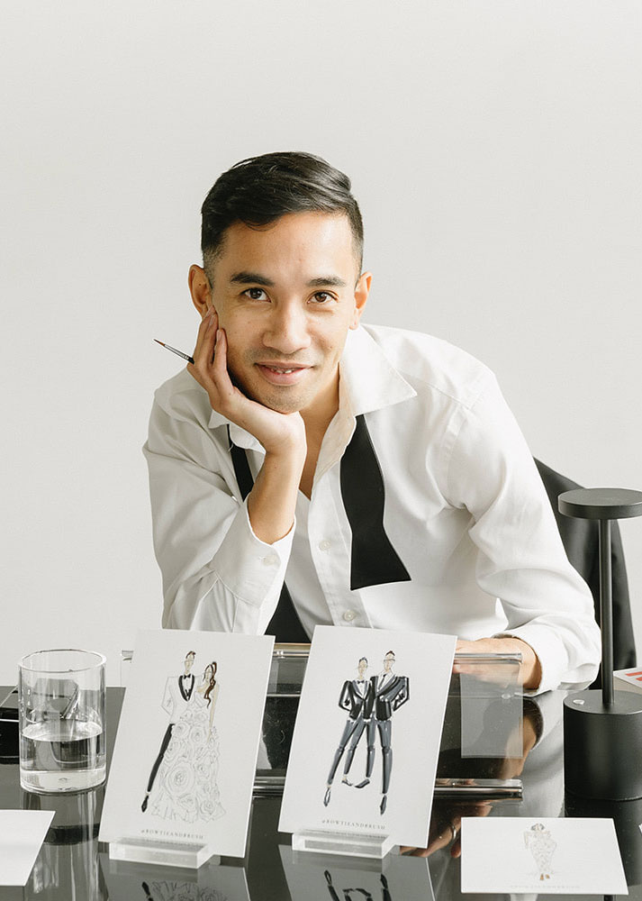 A wedding planner working on her marketing strategy at her laptop. Photo credit Bloom and Flourish Studio