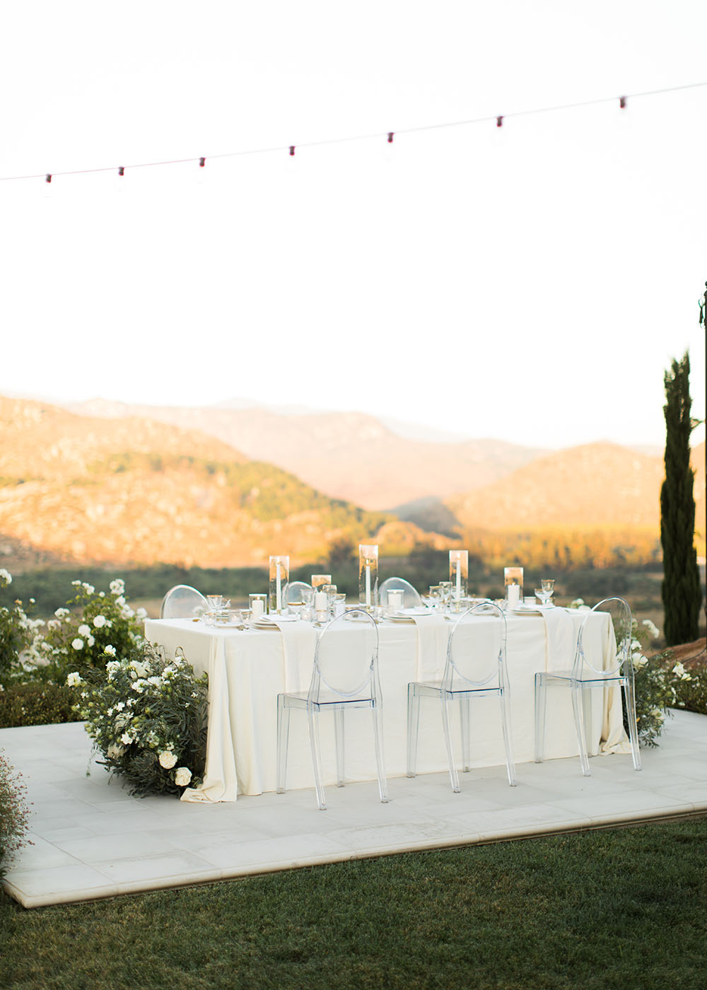 A wedding planner working on her marketing strategy at her laptop. Photo credit Bloom and Flourish Studio
