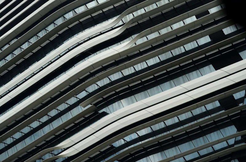 Abstract architectural detail of a modern industrial facility showcasing the precision and innovation of advanced manufacturing.