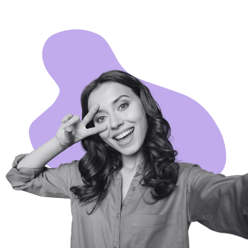 Smiling female content creator taking a selfie for an influencer marketing campaign.