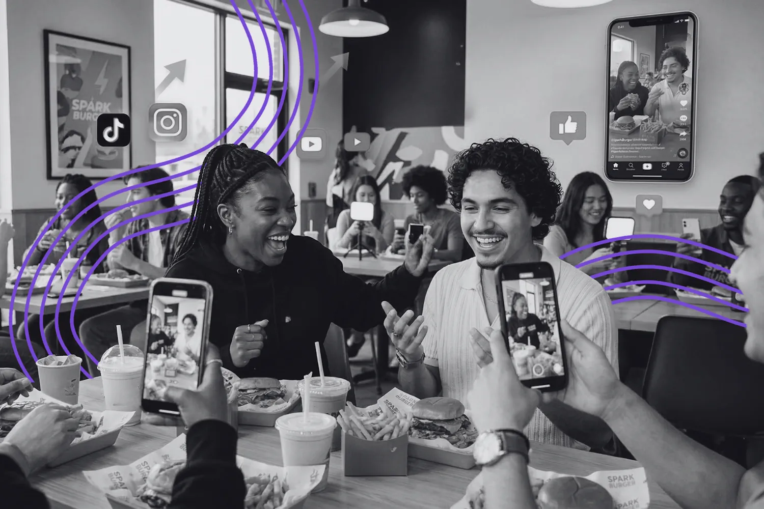 Customers in a restaurant filming food for TikTok and Instagram, representing a QSR digital growth and social media reputation strategy.