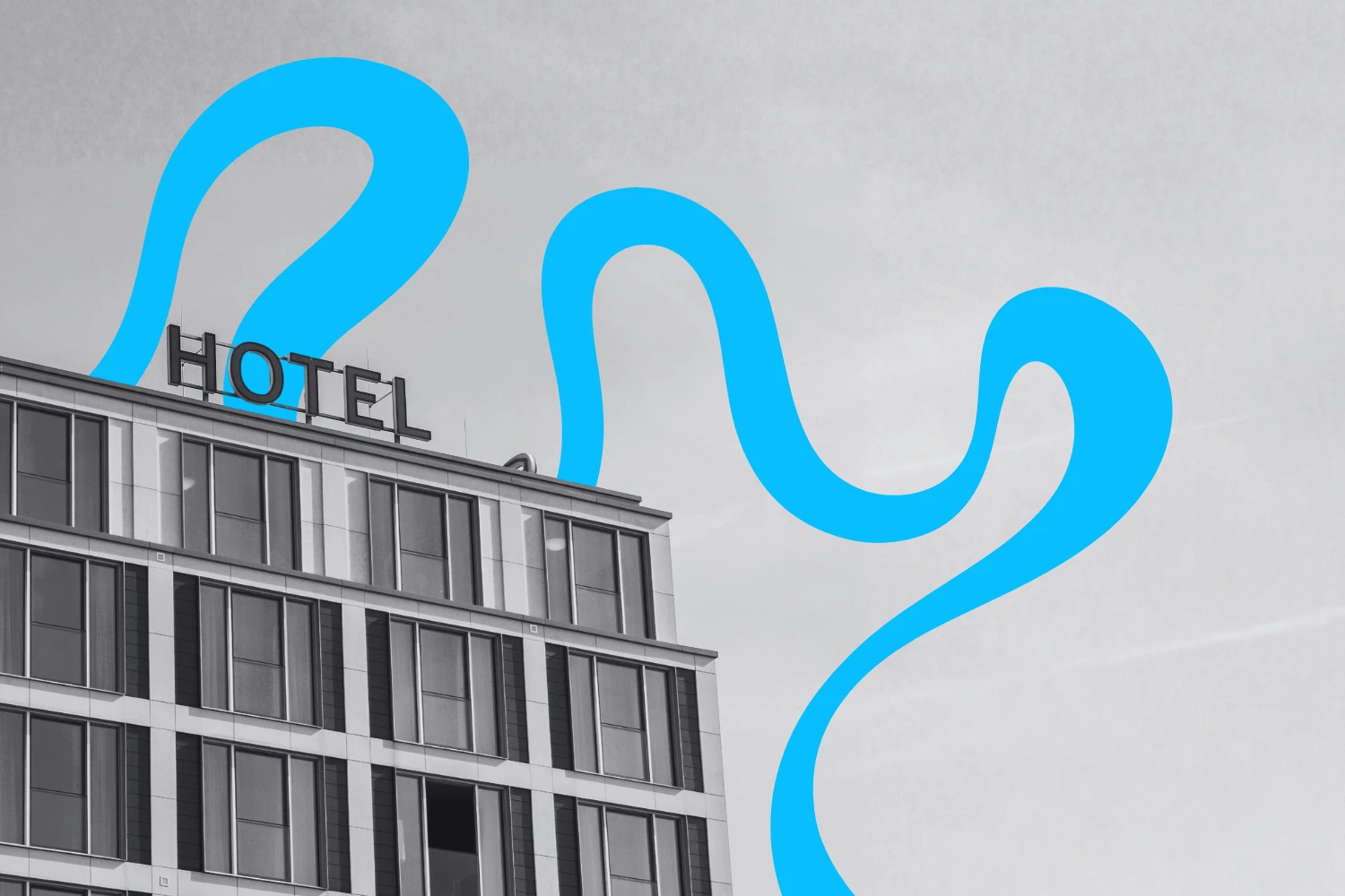 Modern hotel building exterior featuring a rooftop hotel sign, highlighting Bolt PR's airport hotel awareness campaign.