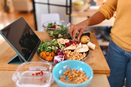 person preparing fiber rich food on a kitchen counter