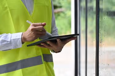 Man doing exterior inspection