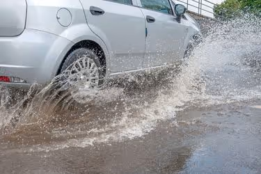 Car going through a flooded area
