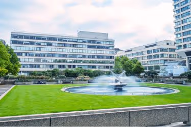 Hospital with greenery and fountain