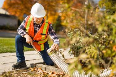 Inspector checking Outdoor Drainage