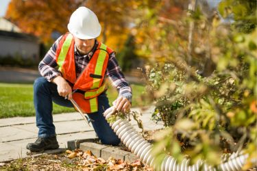 Inspector checking Outdoor Drainage