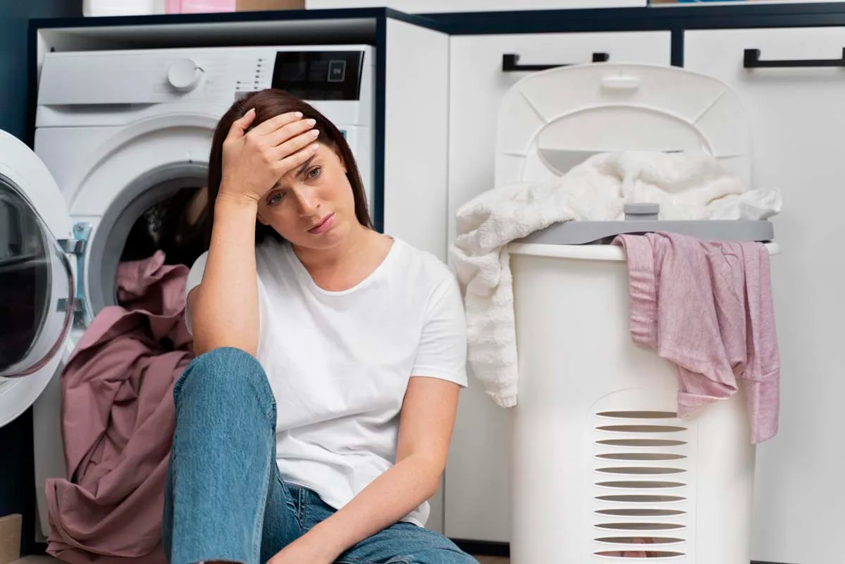 Featured Blog: A woman looking at a dishwasher