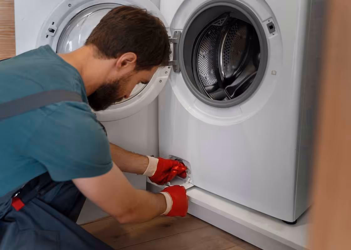 Featured Blog: A woman looking at a dishwasher