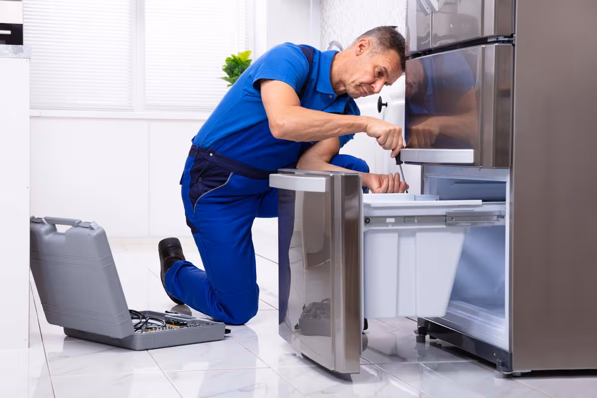 Featured Blog: A woman looking at a dishwasher