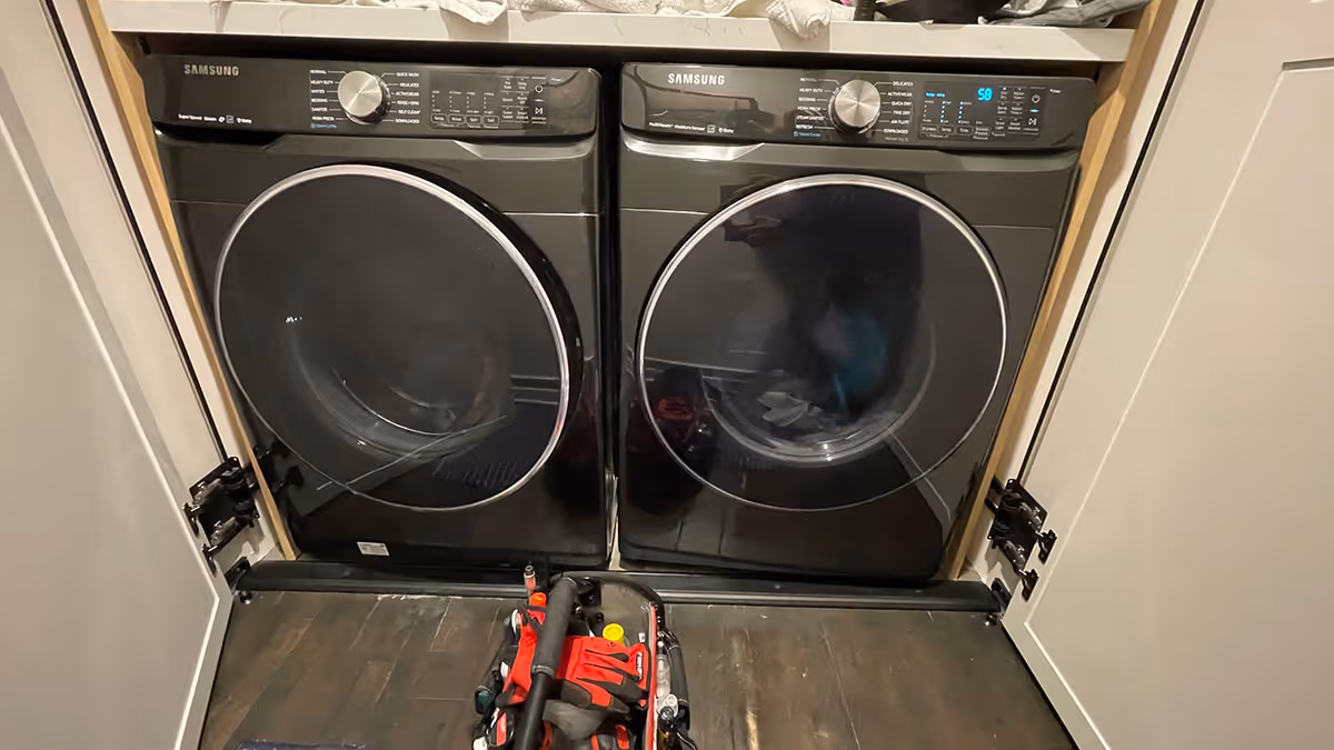 Featured Blog: A woman looking at a dishwasher