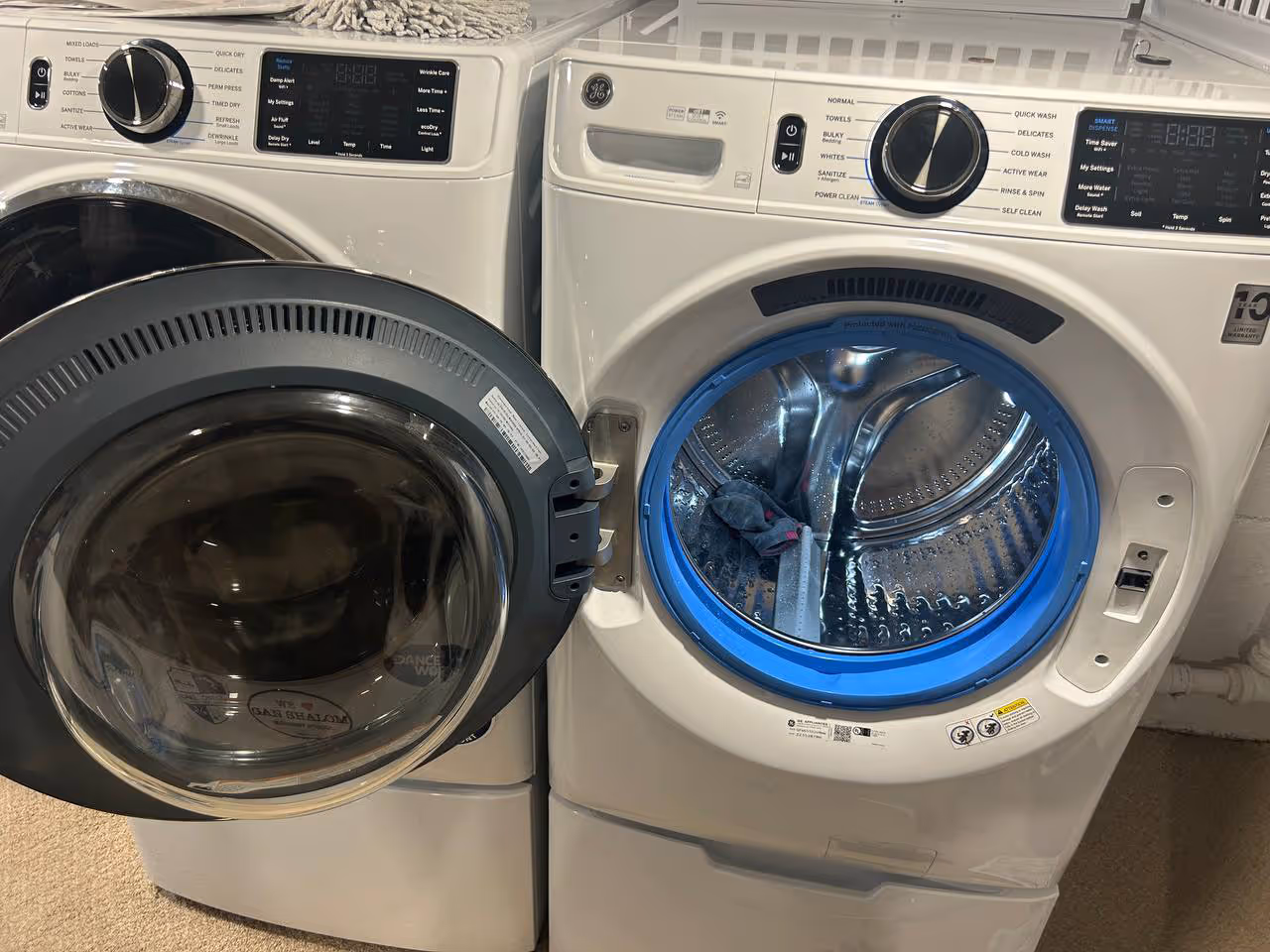 Featured Blog: A woman looking at a dishwasher