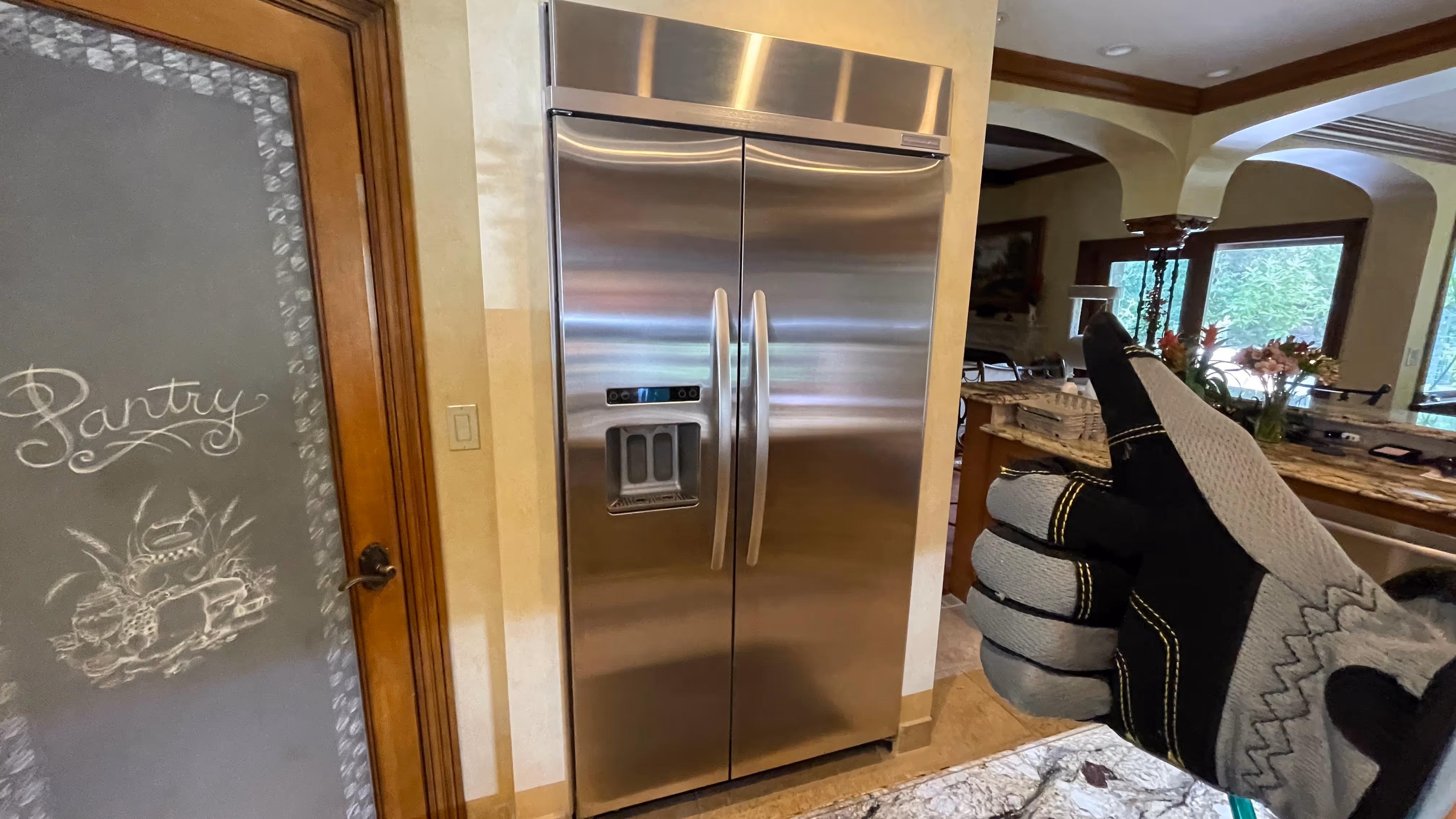 Featured Blog: A woman looking at a dishwasher