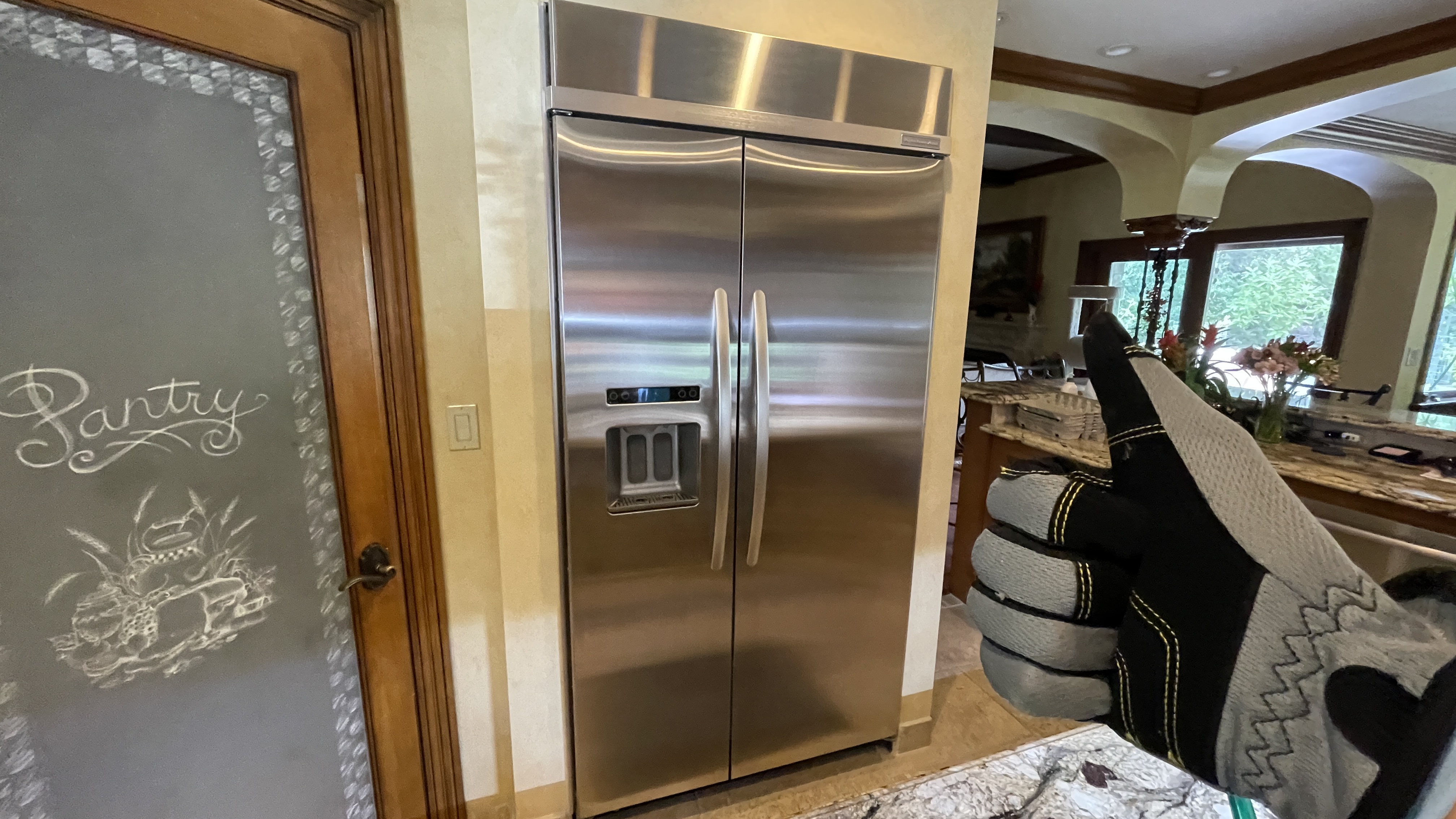 Featured Blog: A woman looking at a dishwasher