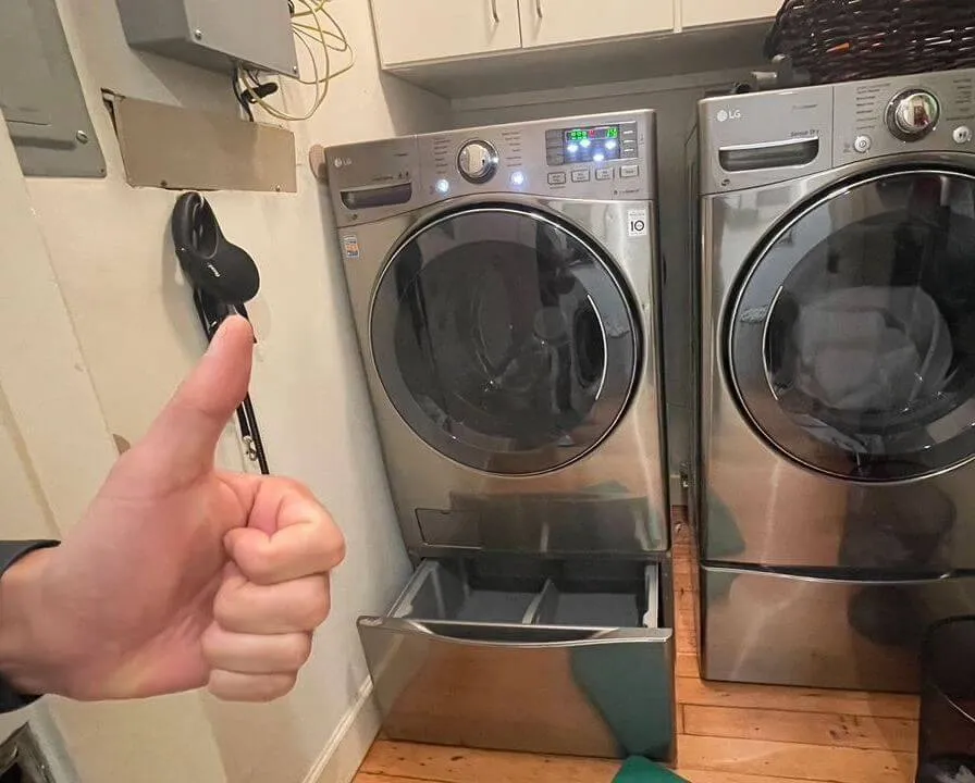 Fully functional stacked washer and dryer after service.