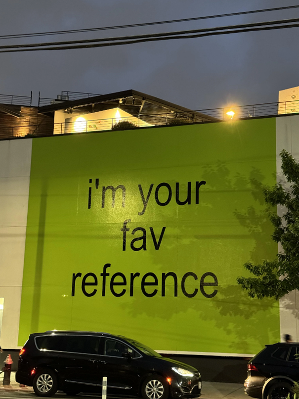 A green wall with black text on itAI-generated content may be incorrect.