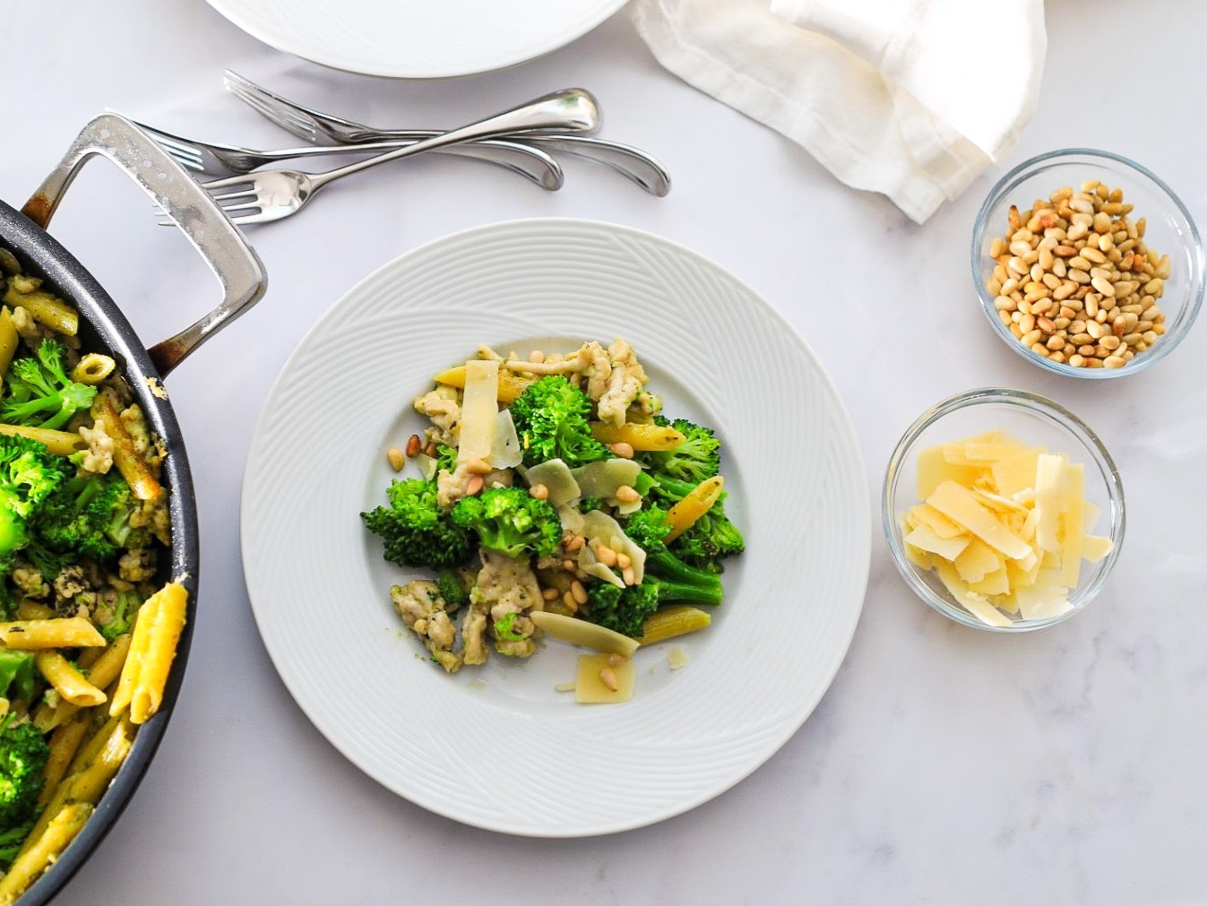Pesto chicken penne with toasted pinenuts and fresh Parmesan