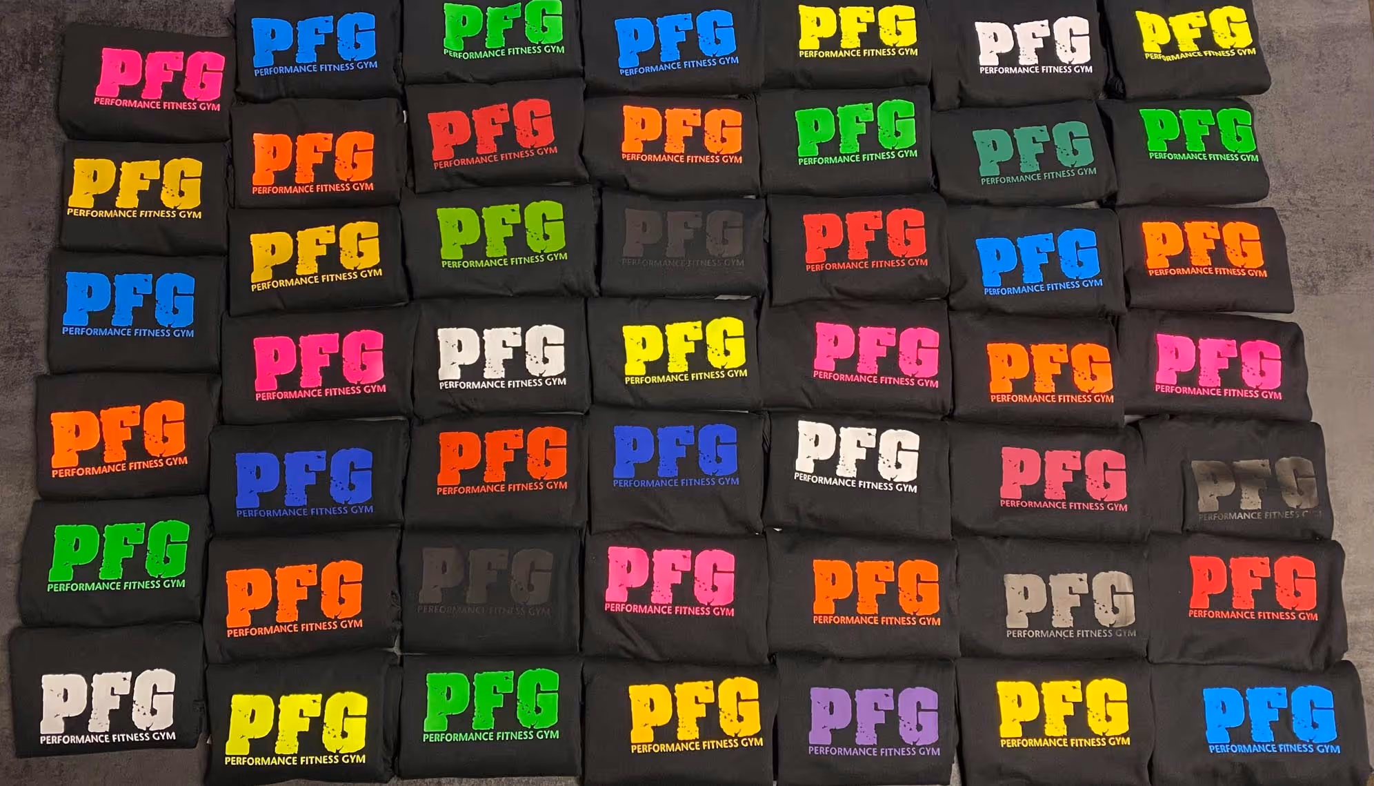 Rows of PFG branded t-shirts