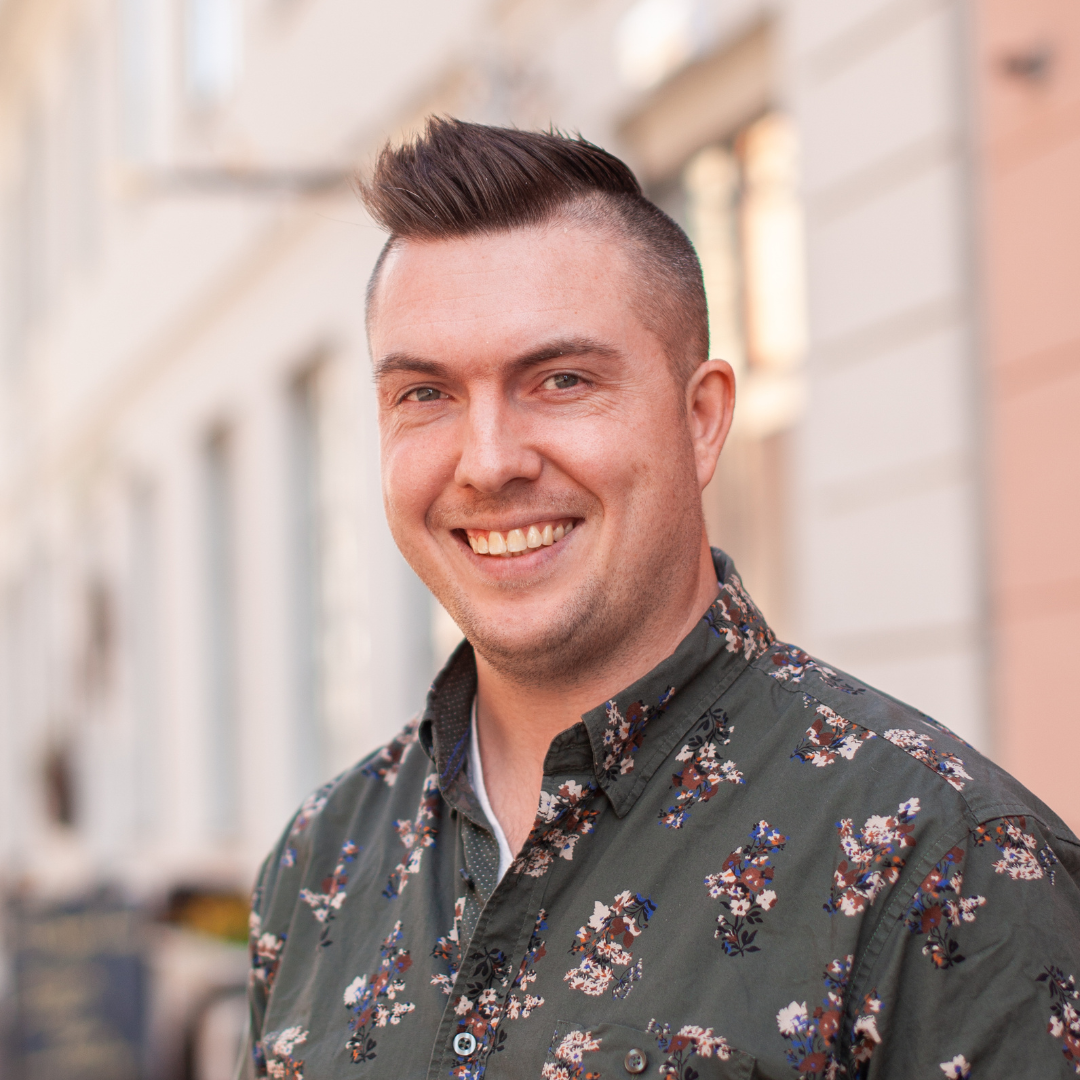 Jonas smiling at camera