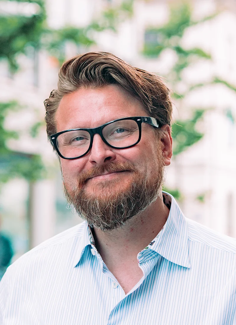 Markus smiling at camera