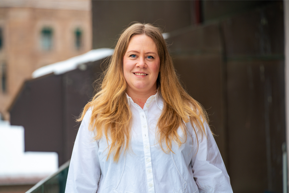 Lene smiling at camera