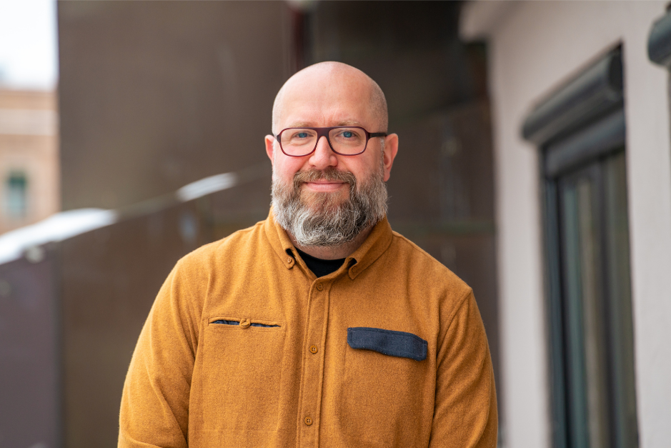 Christian smiling at camera