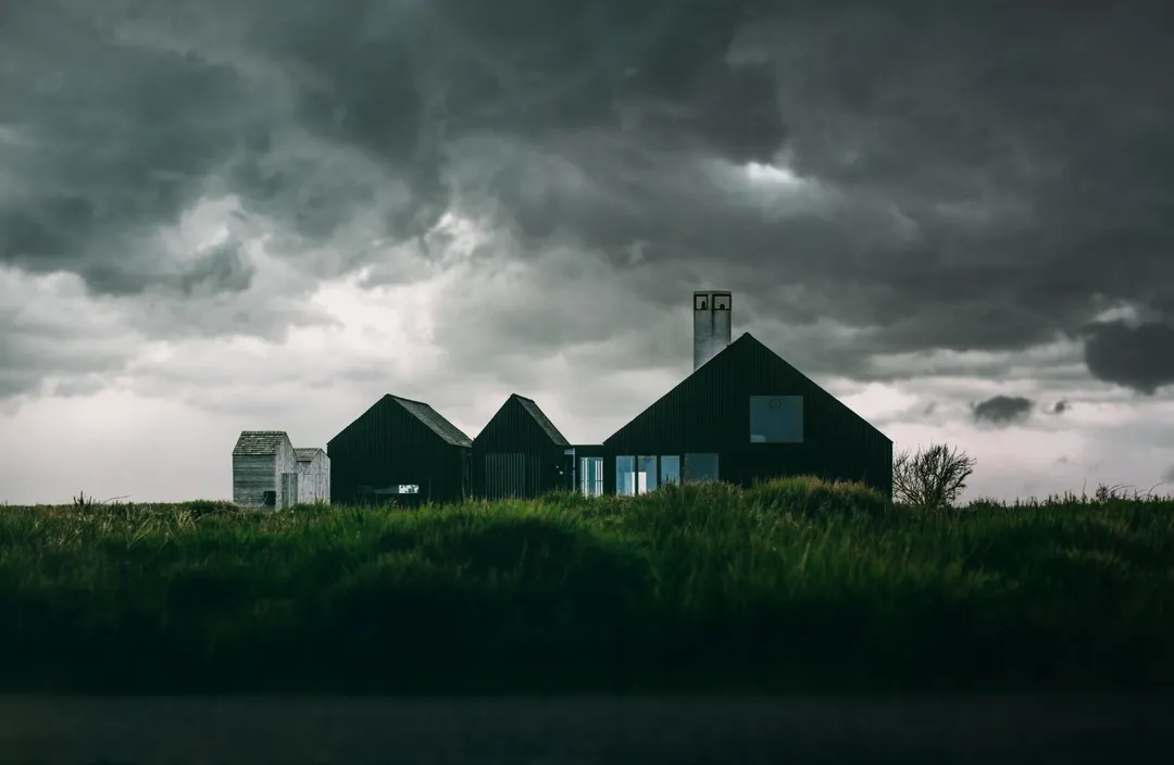 Storm clouds over houses