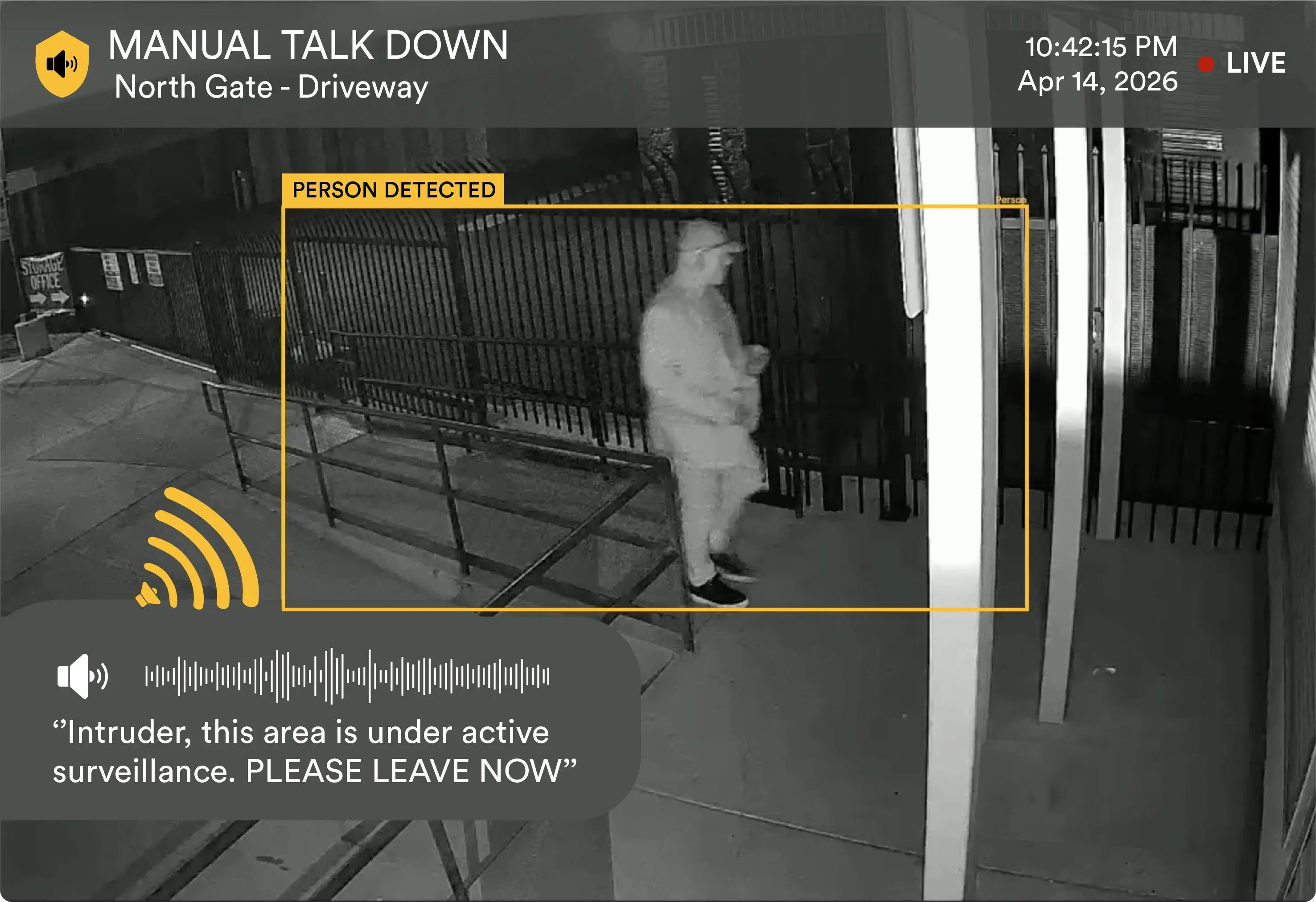 Night surveillance camera shows a person detected at the North Gate driveway with a warning message to leave.