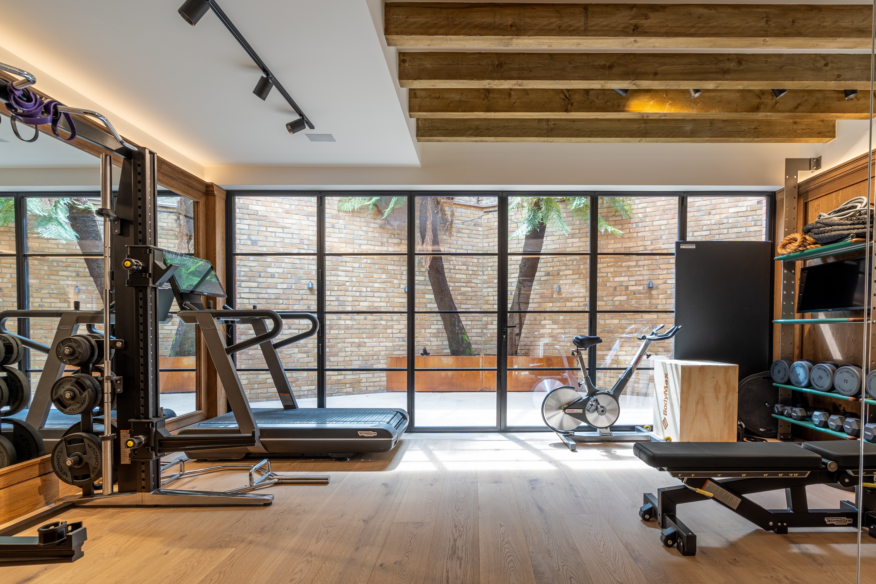 New gym in the basement floor with natural light from the lightwell