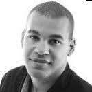 a man smiling for a picture