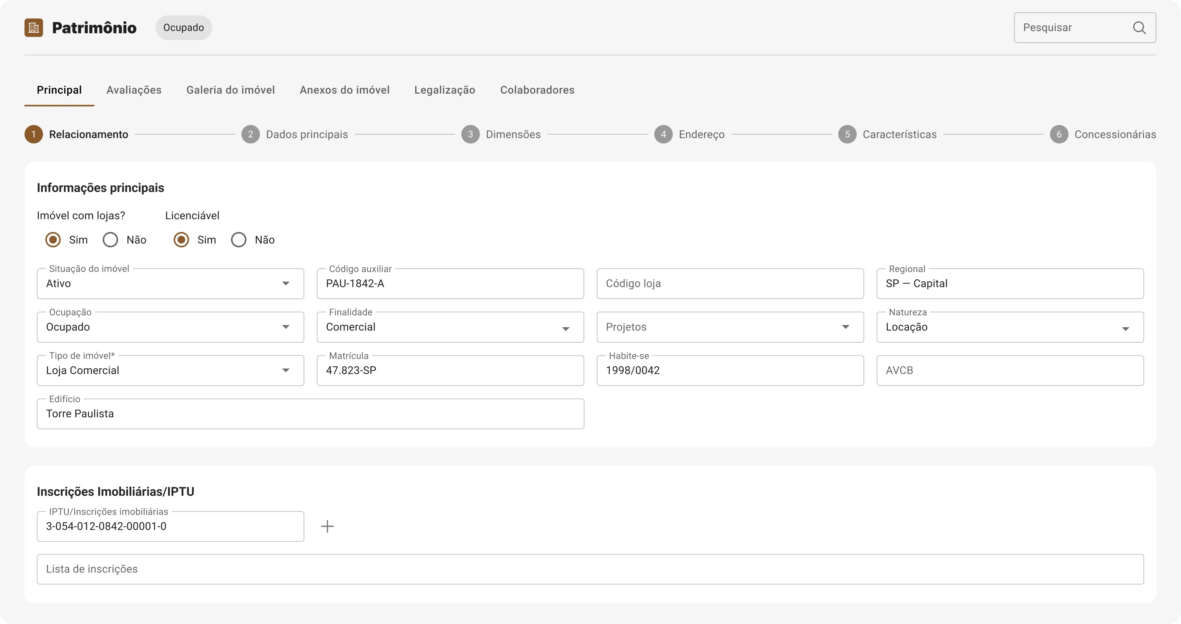 Interface de sistema de gestão de patrimônio mostrando informações principais de um imóvel comercial ocupado na Torre Paulista, São Paulo, com situação ativa e inscrição imobiliária.