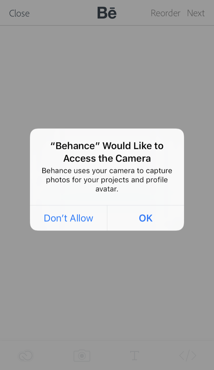 This is a permission request from Behance mobile app. Behance uses the native request dialog modal window to ask for access to user's smartphone camera