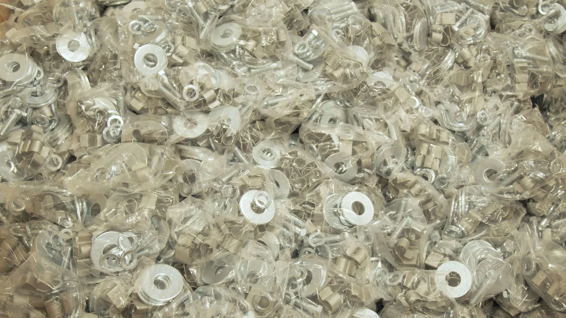 Bags filled with metal washers and small hardware components